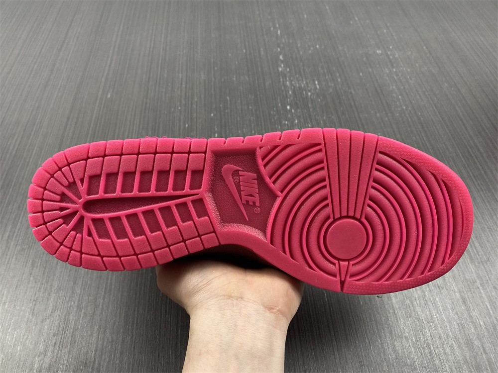 from Nike Spruces Up Its Dunk Low Team Red/Pink DQ9324-600