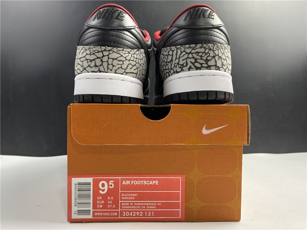 from Supreme × Nike SB Dunk Low “Black Cement 304292-131