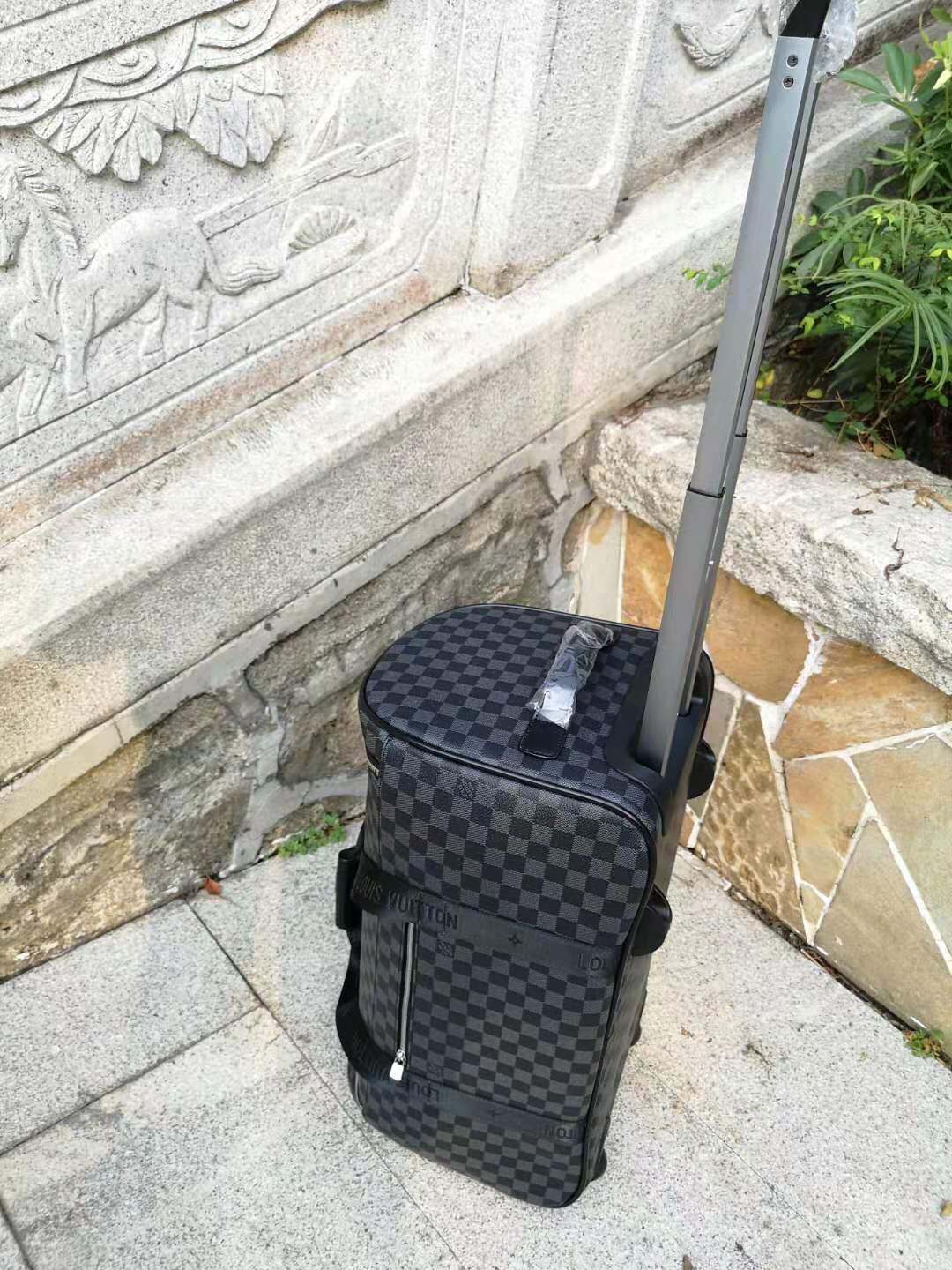 L*ouis V*uitton Luggage